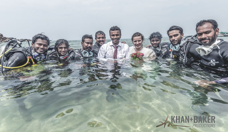 under-water-wedding-team-kovalam Nikhil and Eunika escorted into the ocean by the team of divers from Bond Safari, Thiruvananthapuram