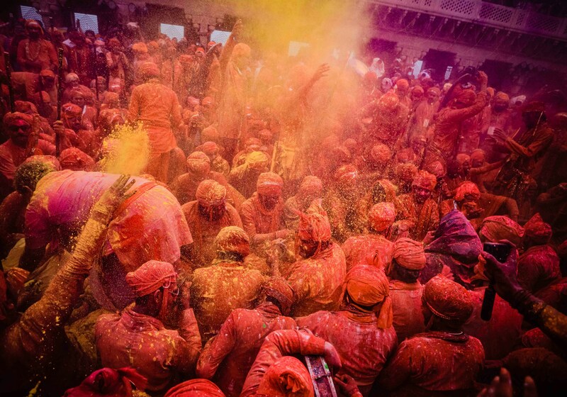 people-playing-with-holi-colors people celebrate holi
